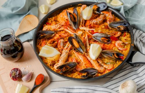 Elegant Spanish Cuisine and More - Paella Mixta with sauce and spices